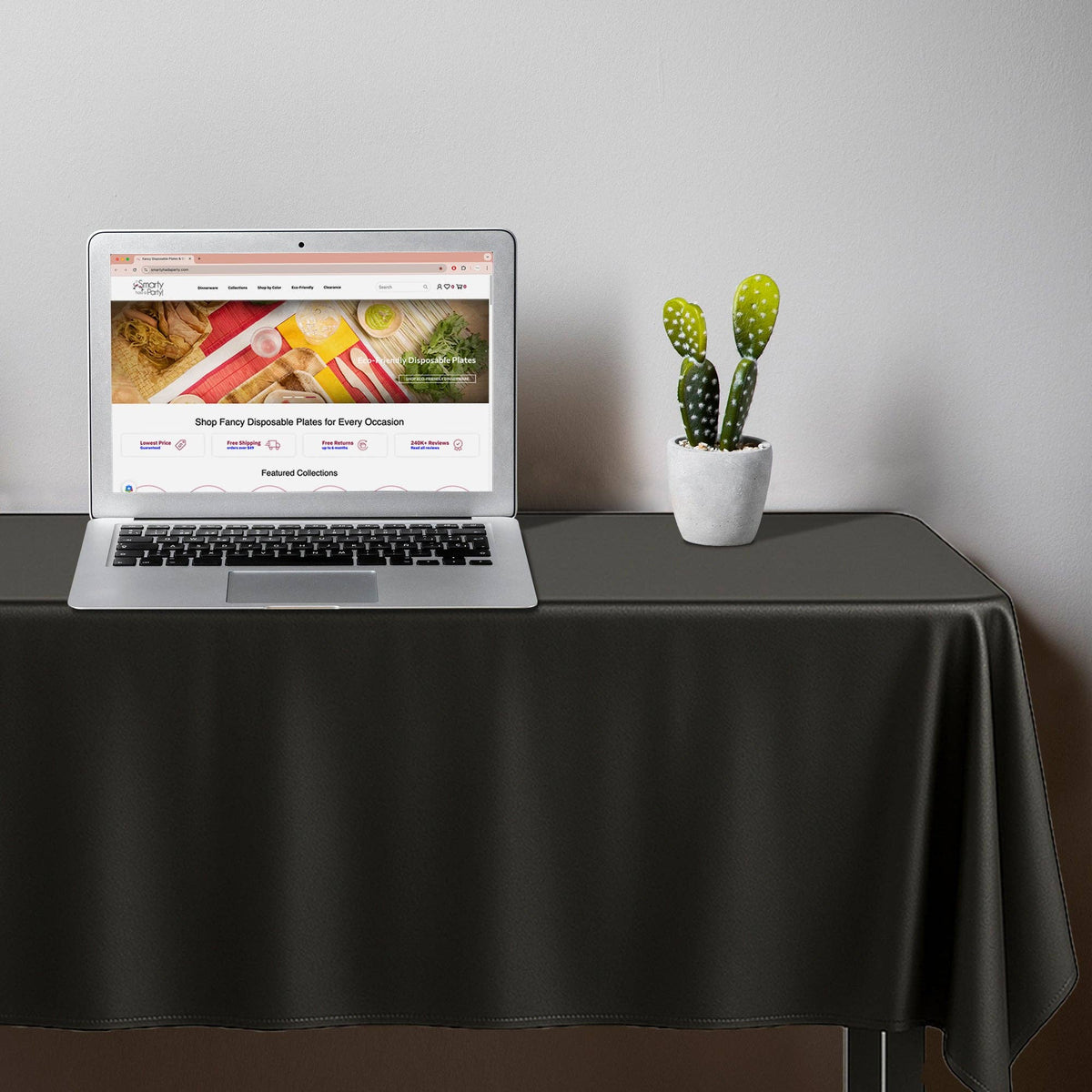 54" x 108" Black Rectangular Plastic Tablecloth | 1 pc